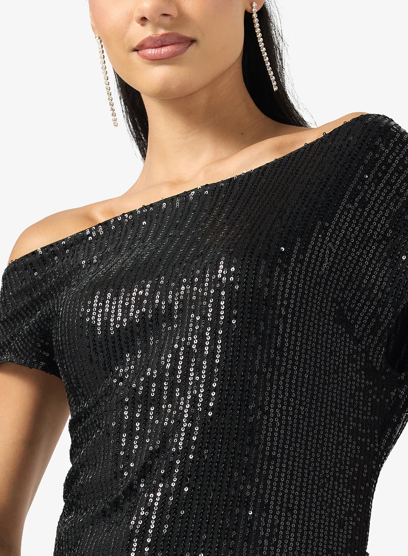 جينجر بلوزة بكتف ساقط مزينة بالترتر