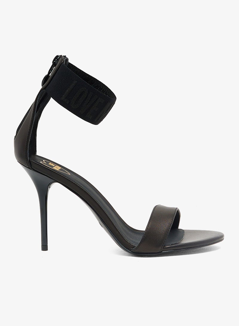 لوف موسكينو صنادل بكعب عالٍ بحزام للكاحل - Image 1