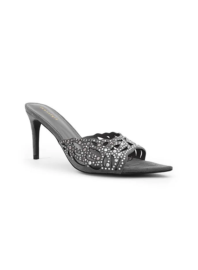 أيقون Shiny heel slipper perfect for evening occasions.