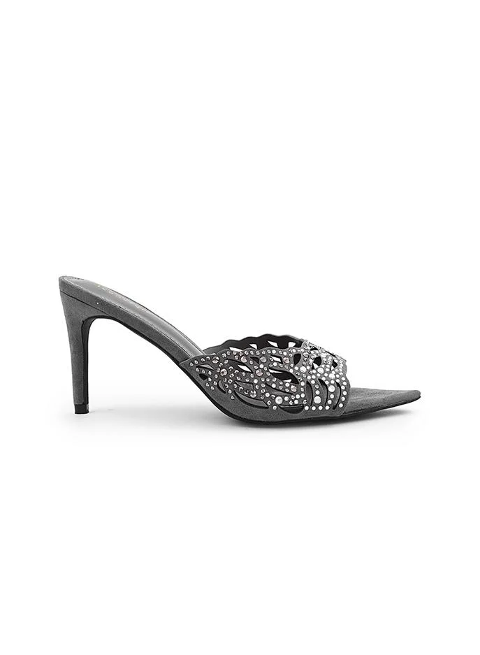 أيقون Shiny heel slipper perfect for evening occasions.