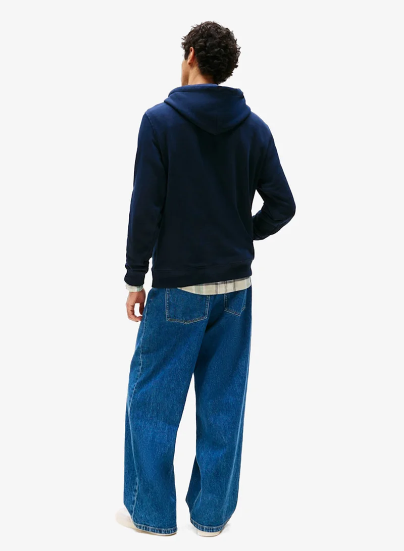 تومي جينز هودي بقصة عادية مزين بالشعار