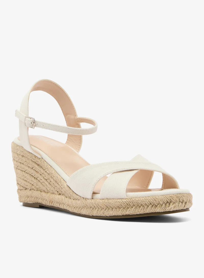 ريد صنادل بكعب وحزام للكاحل