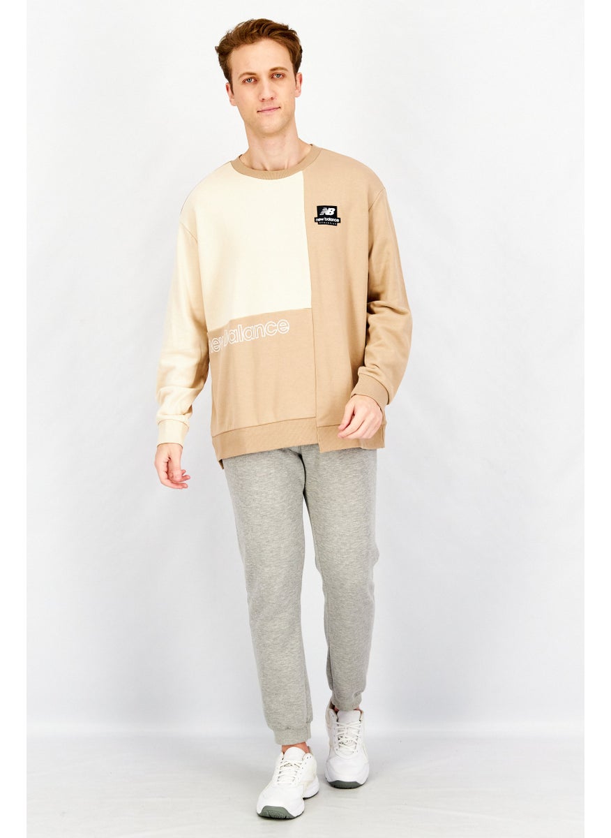 New Balance - Men Sportswear Fit Athletics Renew Askew Crew Neck Sweatshirt, Tan - Image 1