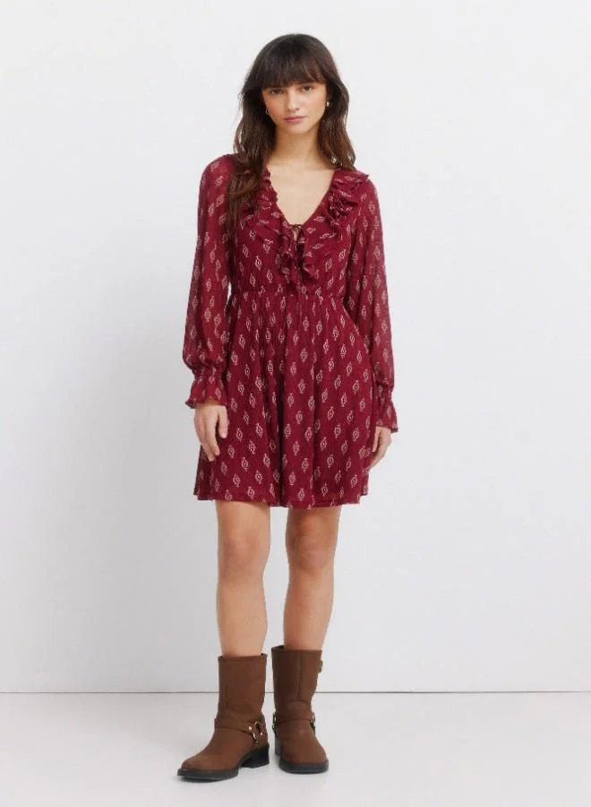 Printed semi-fitted V-neck double ruffle tie fastening underbust cut flared skirt ruffled cuffs short dress