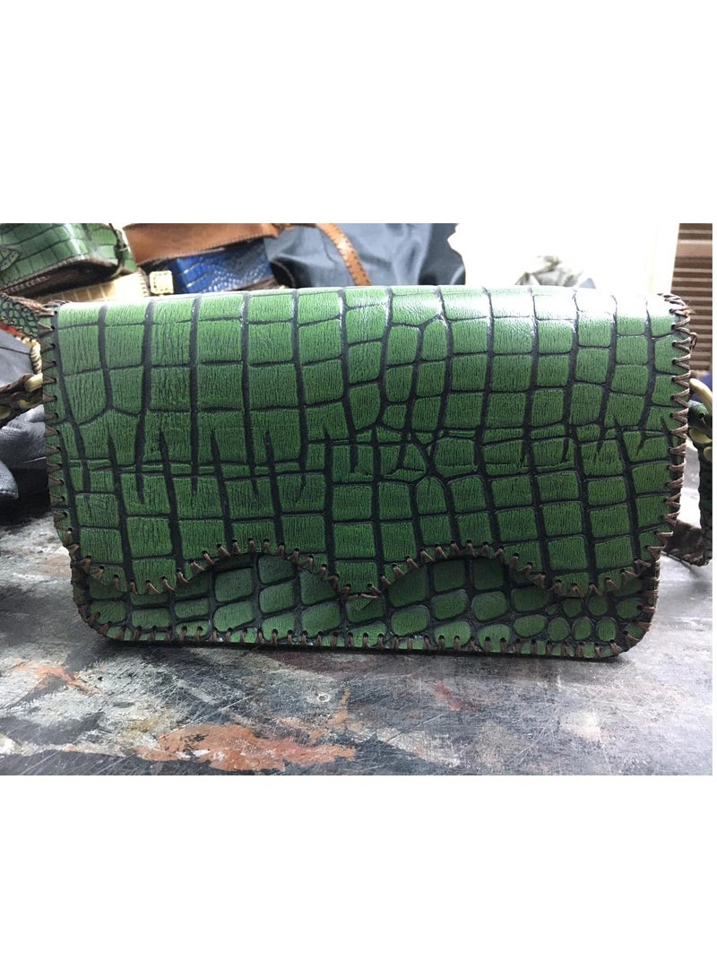 🎒 Girls’ Crossbody Bag – Handmade Lazar Leather with Elegant Touch 100% genuine lazar leather Soft velvet lining 3 zipper compartments for better organization Card slots included Handle + crossbody strap Size: 22×18 cm Trendy and practical for school, outings, or daily use  Timeless craftsmanship meets modern style  🛒 Available now onNoon  - Image 1