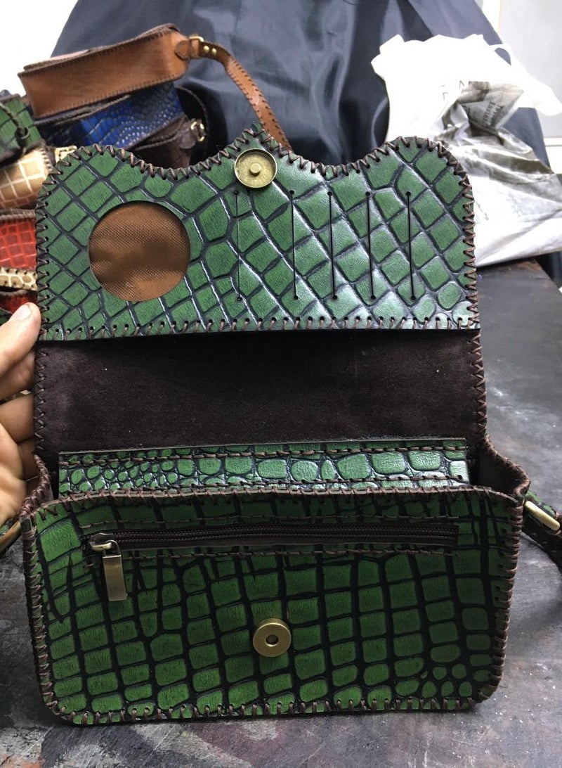 🎒 Girls’ Crossbody Bag – Handmade Lazar Leather with Elegant Touch 100% genuine lazar leather Soft velvet lining 3 zipper compartments for better organization Card slots included Handle + crossbody strap Size: 22×18 cm Trendy and practical for school, outings, or daily use  Timeless craftsmanship meets modern style  🛒 Available now onNoon  - Image 2