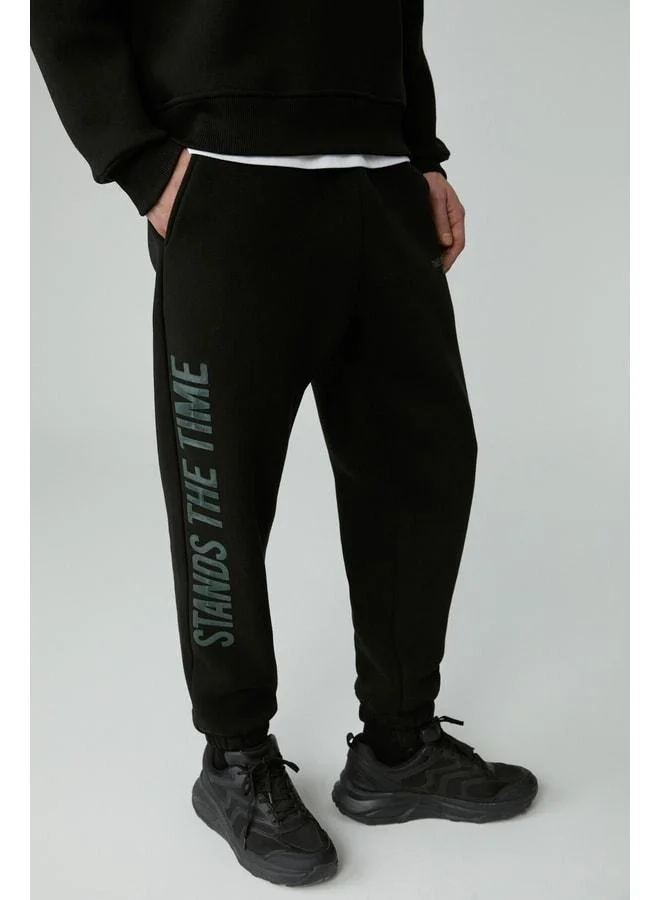 GRIMELANGE STANDS Men's Cotton Soft Black Sweatpants with Fleece Lining.