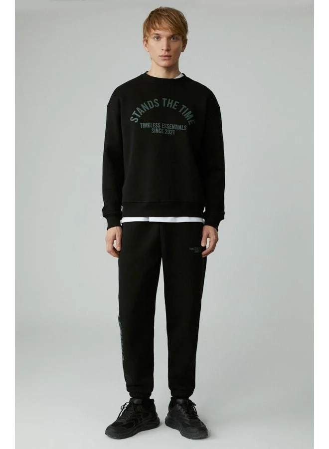 GRIMELANGE STANDS Men's Cotton Soft Black Sweatpants with Fleece Lining.