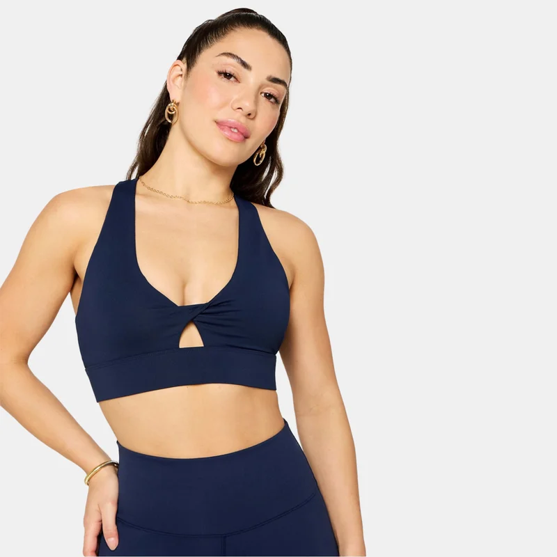 Fabletics حمالة صدر رياضية للتدريب بدعم متوسط للنساء - Oasis Twist