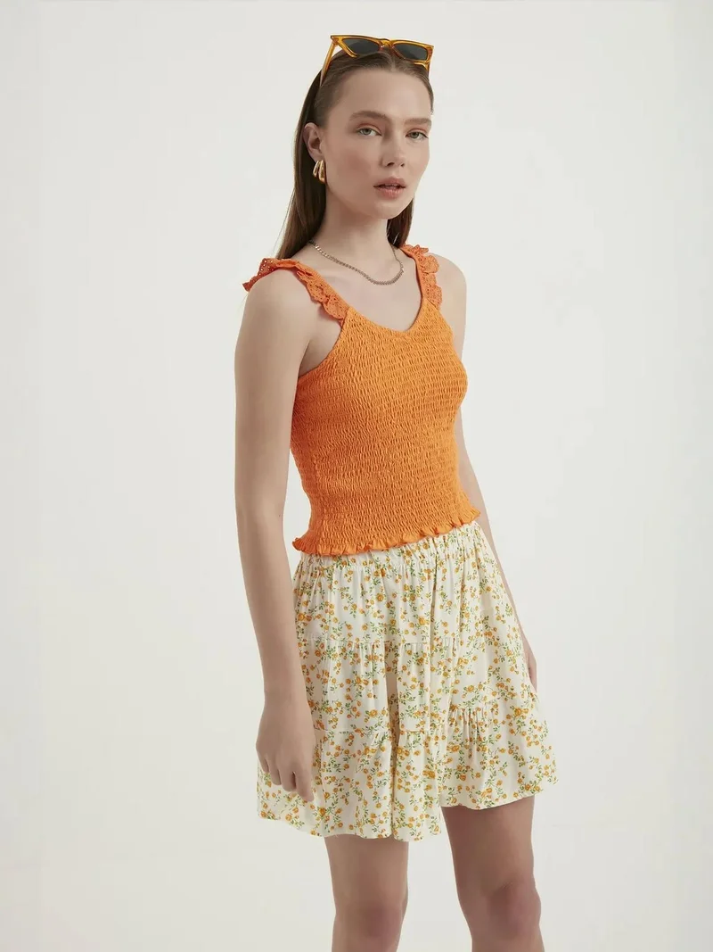 HICCUP V Neck Smocked Cropped Top