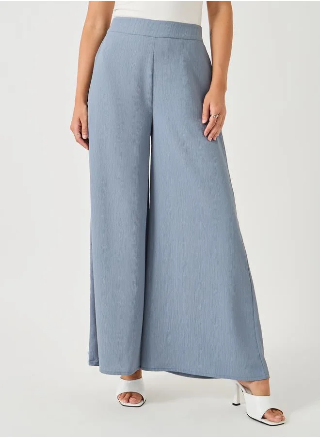 ستايلي Styli Crinkled Flat Front Wide Leg Pants with Side Pockets