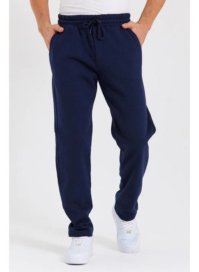 Navy Blue Men’s Cotton-Lined Straight-Leg Sweatpants with Back Pocket and Label Detail.