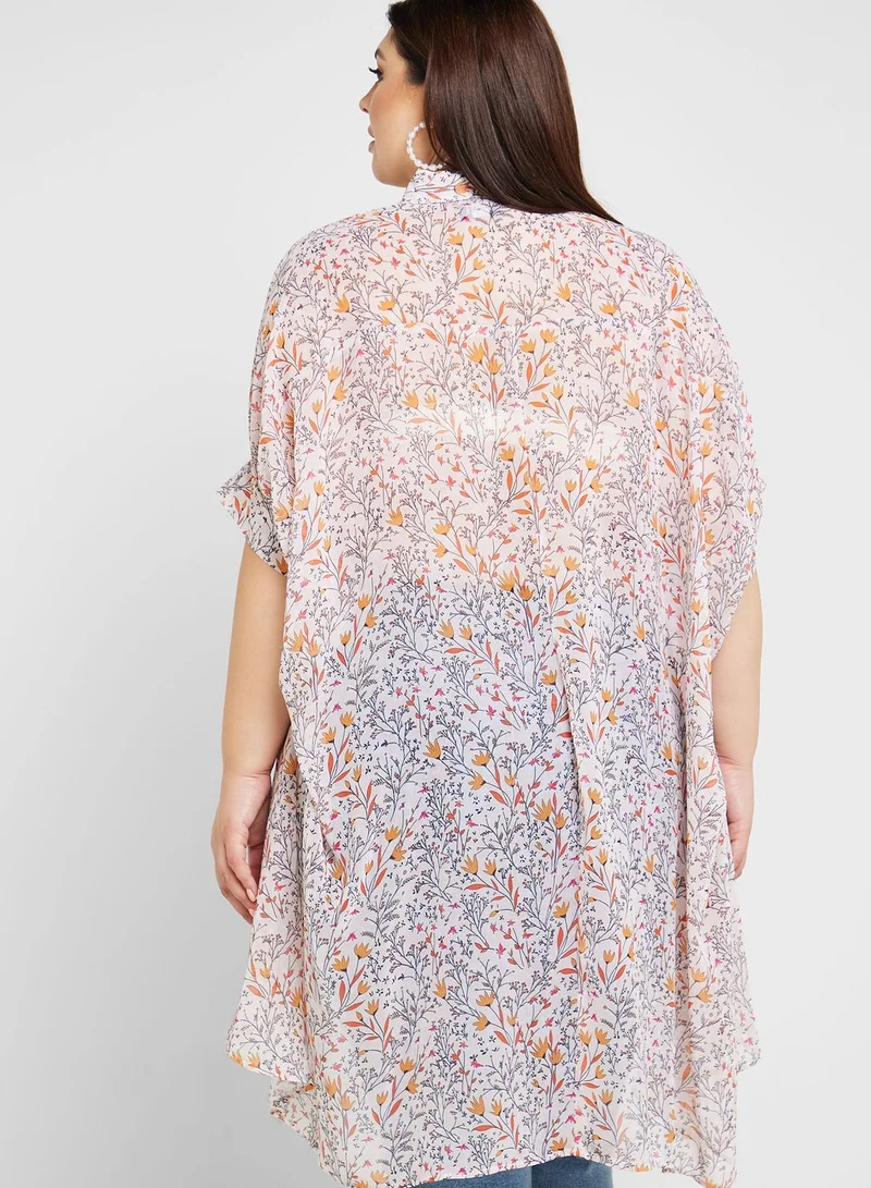 Ella Plus Puff Sleeve Asymmetrical Hem Tunic