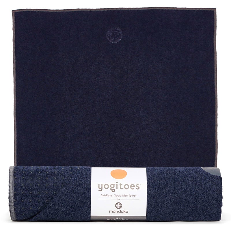 Manduka Yogitoes Yoga Mat Towel - Lightweight, Quick Drying Microfiber, Non Slip Skidless Technology, Use in Hot Yoga, Vinyasa and Power, 71" x 24", Midnight - Image 1