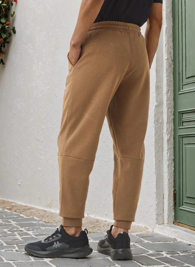 Kappa  Kappa Regular Fit Panelled Joggers for Men | Best Price UAE