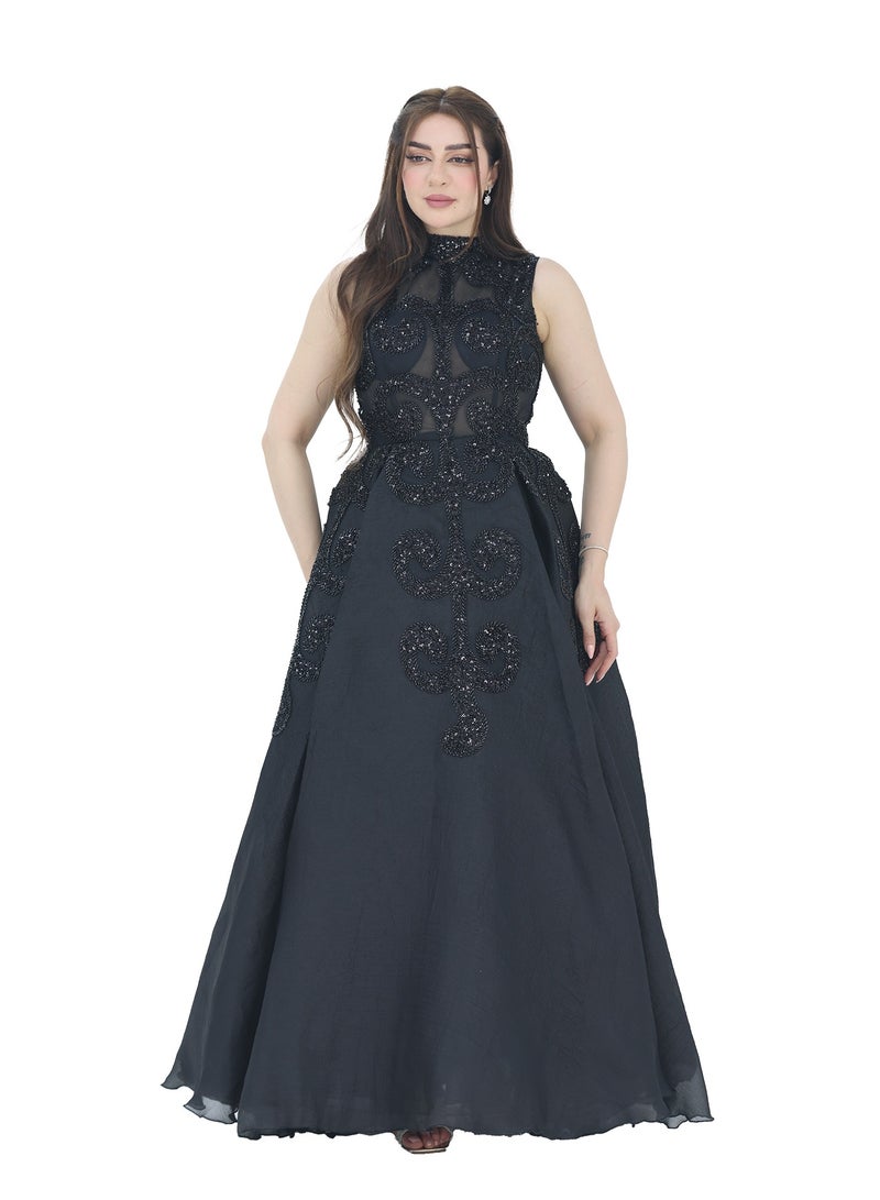 Modern Design A luxurious black evening dress made of Aqinza material. The dress is designed with a high collar and embroidery in the shape of a luxurious tree. A royal cut that highlights the beauty of the figure  - Image 1