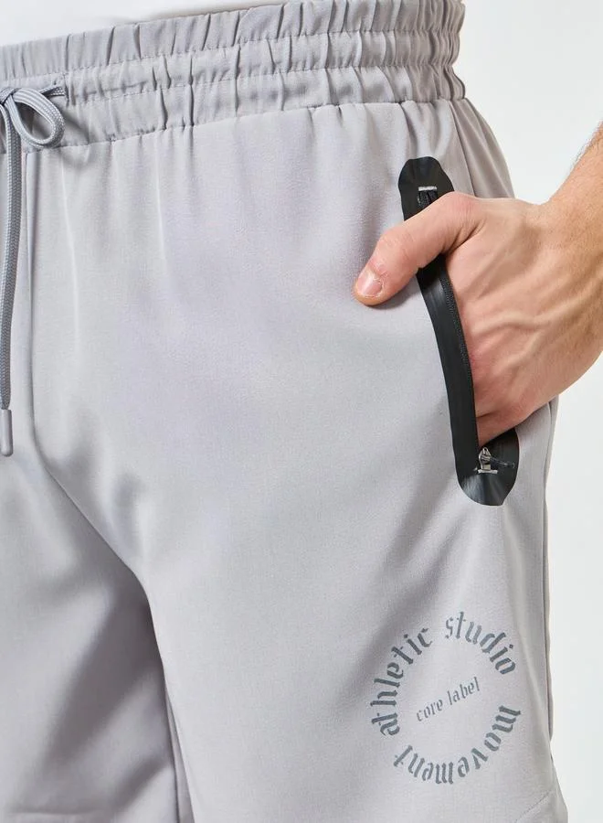 Styli Active Grey Men Printed Zip Pocket Regular Fit Shorts for Men | Best Price UAE