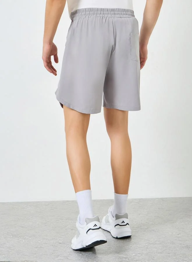 Styli Active Grey Men Printed Zip Pocket Regular Fit Shorts for Men | Best Price UAE