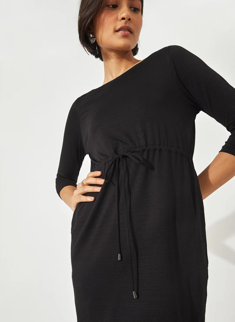 The Label Life Black Drawstring Mini Dress – Chic & Flowy