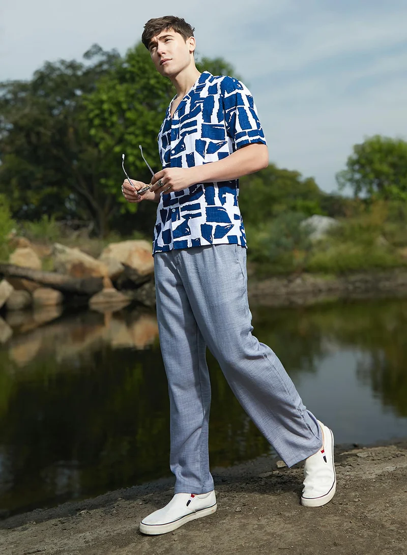Campus Sutra Campus Sutra Men's Electric Blue & Cream White Imprint Oversized Shirt For Casual Wear | Cuban Collar | Short Sleeves | Button Closure | Oversized Shirt Crafted With Comfort Fit For Everyday Wear
