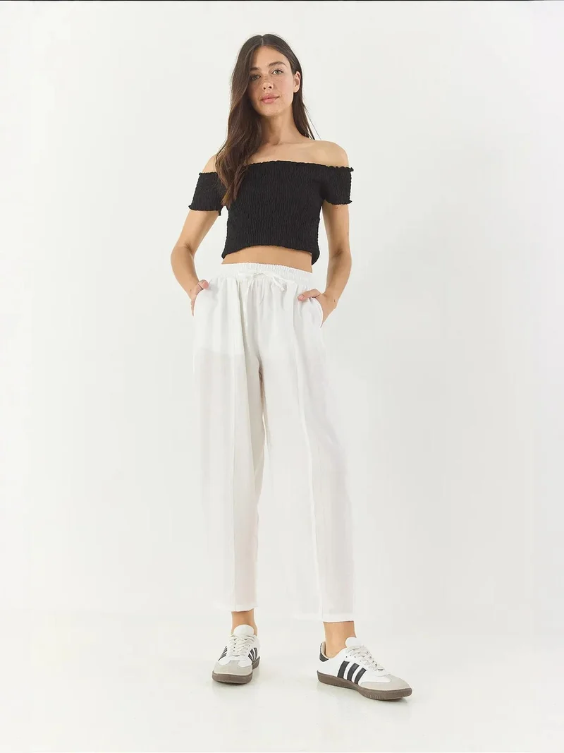 بيانكو لوتشي بنطلون لوكسي واسع الساق بنقوش مع رباط وجيوب