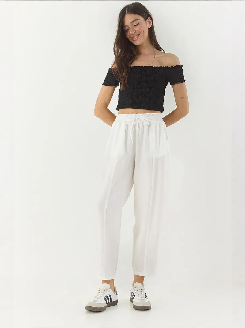 بيانكو لوتشي بنطلون لوكسي واسع الساق بنقوش مع رباط وجيوب