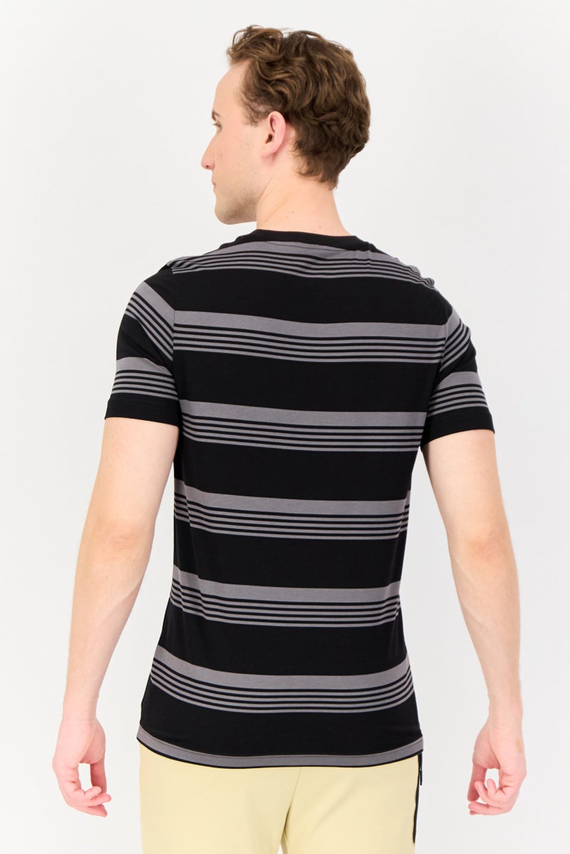 PUMA تي شيرت رياضي للرجال بأكمام قصيرة مناسب للخارج، متعدد الألوان - Image 3