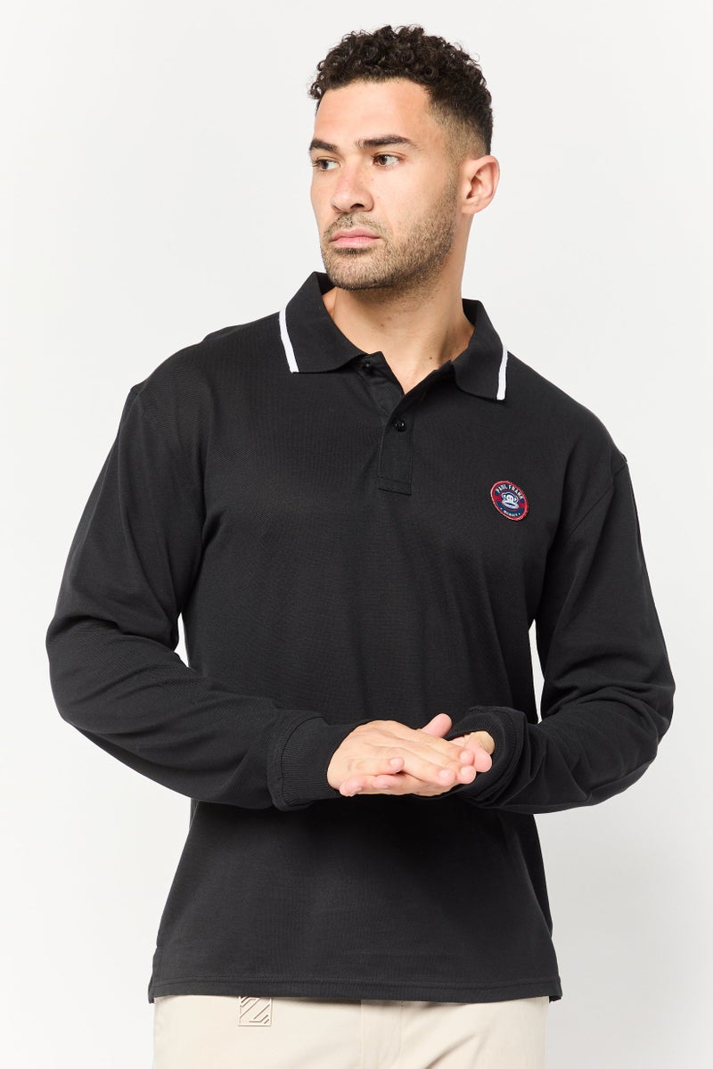 Paul Frank قميص بولو بأكمام طويلة للرجال بتصميم عادي مع شعار العلامة التجارية، أسود - Image 1