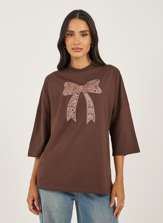 Styli Bow Graphic Exaggerated Sleeve Oversized Longline T-Shirtâ€‹ - Image 1