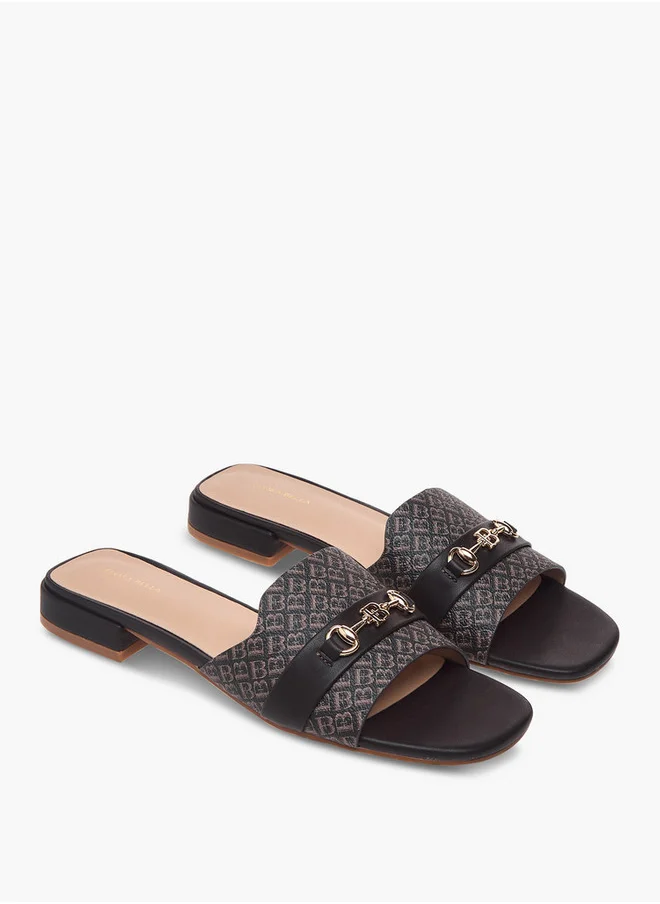 فلورا بيلا من شو إكسبرس Women's Textured Slip-On Sandals with Metal Accent