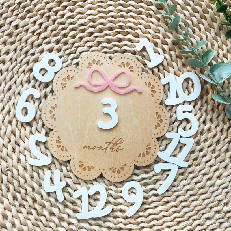 eoscasely Monthly Baby Milestone Wooden Signs, Double-Sided Bow-Themed Baby Milestone Discs with Hello World & My First Holiday Designs â€“Cute Baby Announcement Sign & Photoshoot Props for Boys and Girls (Daisy) - Image 1