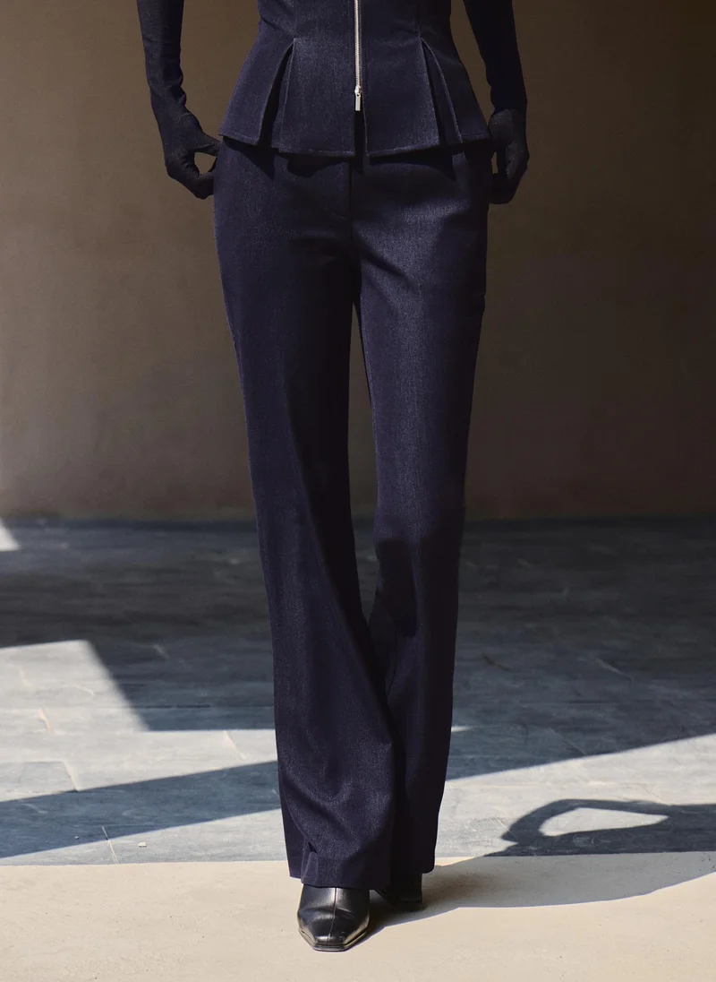 Flared high-waisted trousers