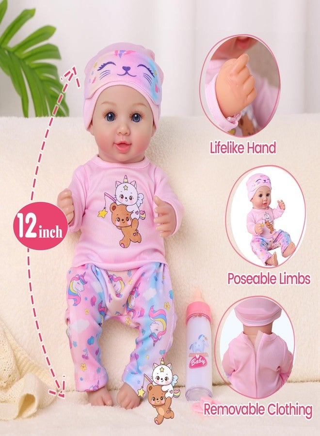 BABESIDE 12 Inch Baby Doll, Realistic Full Vinyl Baby Doll Set with Accessories, Small Baby Doll Toys for Girls 3+, Pretend Play Baby Dolls with Bottle, Ideal for Birthday, Pretend Play, Christmas - Image 5