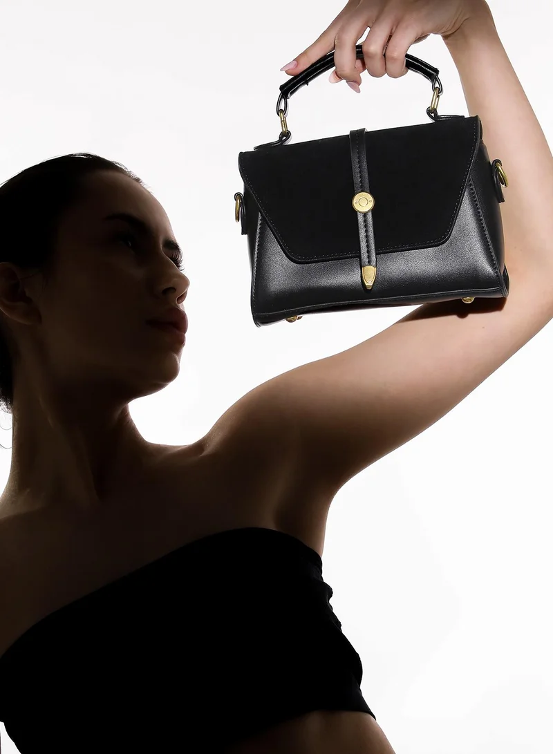 Haute Sauce Solid Magnet Lock Regular Vegan Leather Sling Bag with Detachable Strap For Women