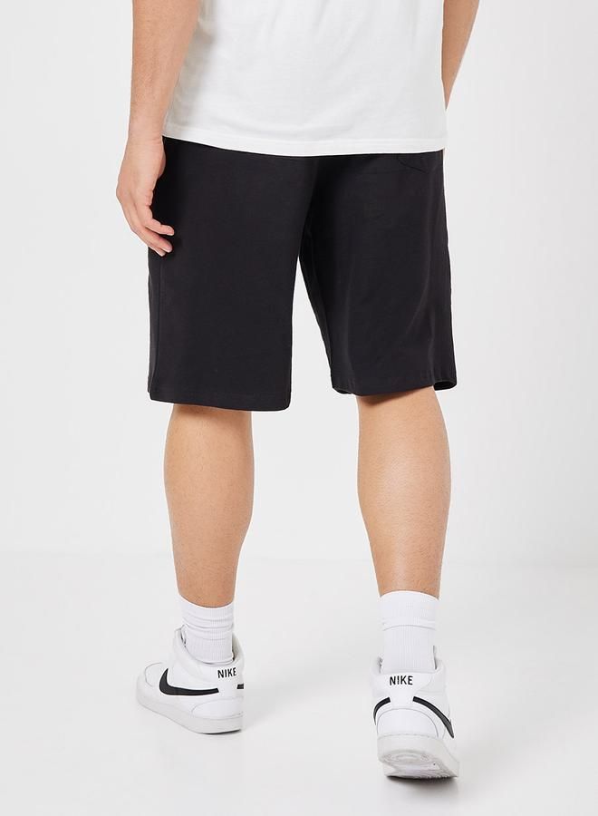 ستايلي شورت واسع بشعار العودة إلى الأساسيات - Image 4