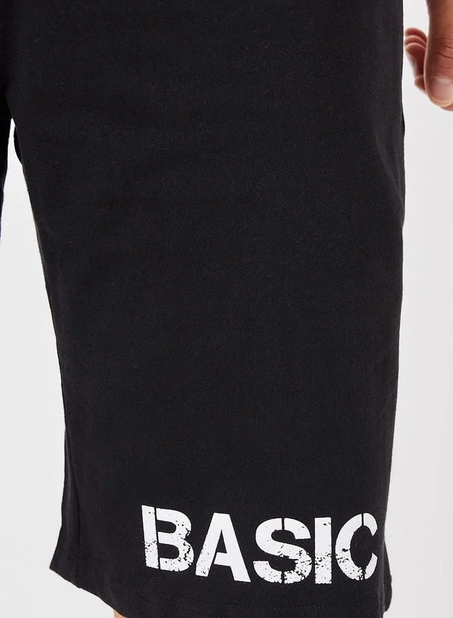 ستايلي شورت واسع بشعار "Back To Basic"