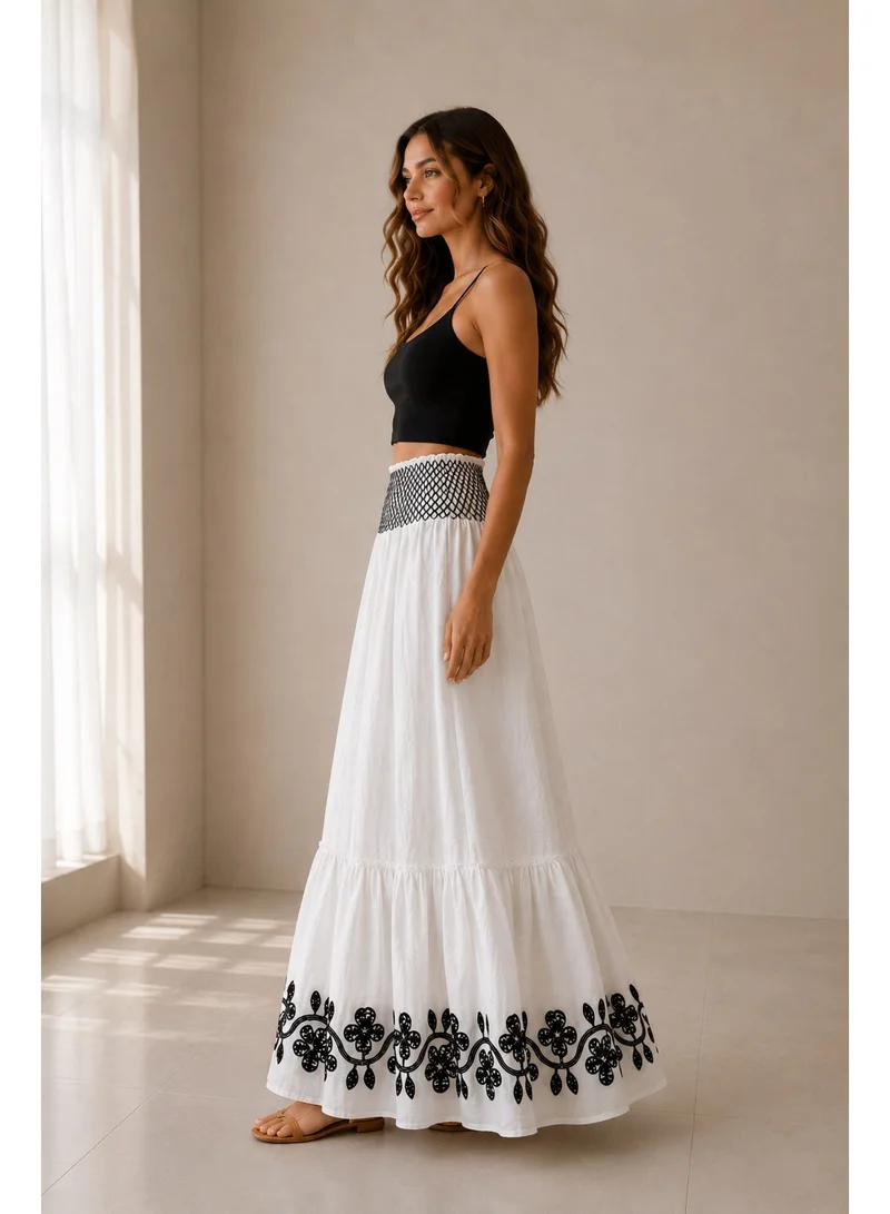 2Trendy Women's Embroidered Maxi Skirt with Decorative Hem - White