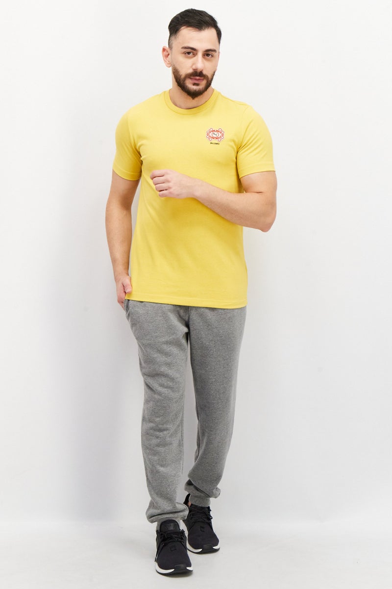 Puma x Palomo Men Sportswear Fit Short Sleeves Embroidered Logo T-Shirt, Mustard - Image 2