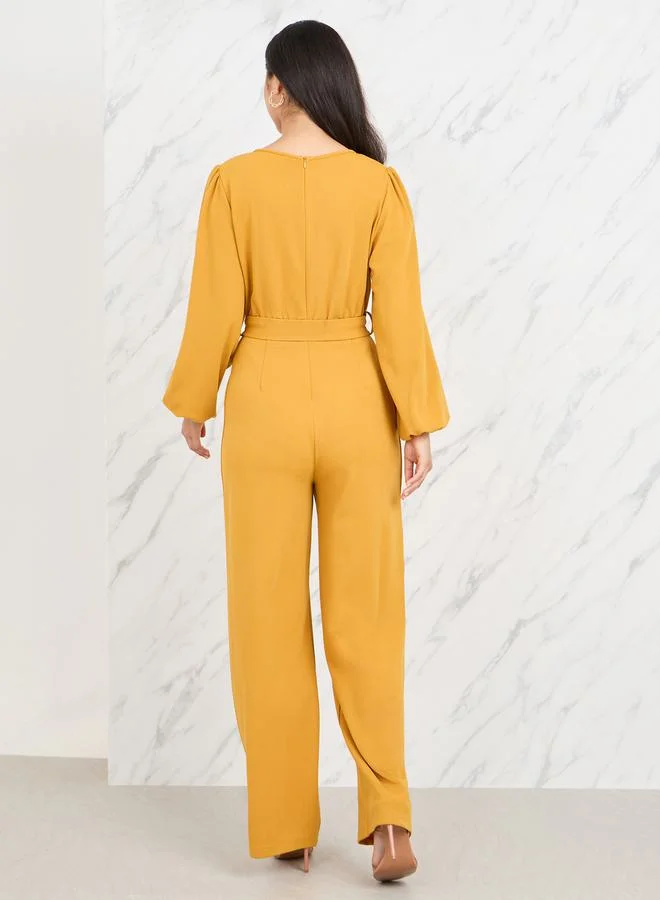 Styli Textured Knit Belted Wide Leg Jumpsuit