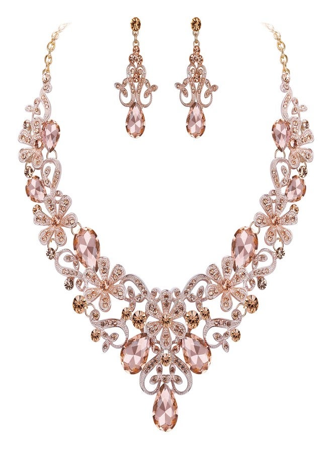 بريلوف طقم مجوهرات نسائي أنيق من بريلوف، يتألف من قلادة وأقراط متدلية بتصميم زهرة كريستالية مزخرفة، بلون الخوخ، مطلي بالذهب الوردي. - Image 1