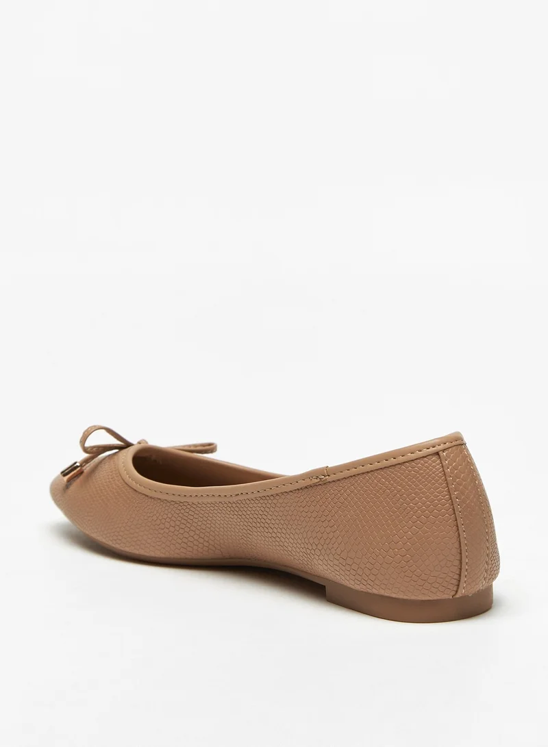 Flora Bella Textured Slip-On Round Toe Ballerina Shoes with Bow Accent
