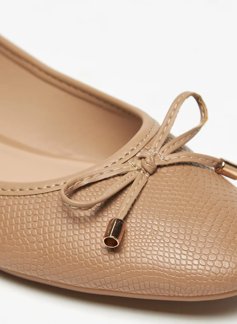 Flora Bella Textured Slip-On Round Toe Ballerina Shoes with Bow Accent