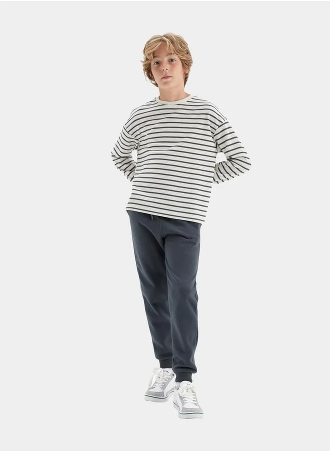DeFacto Relaxed Fit Elasticated Cuff Joggers with Pockets by Styli