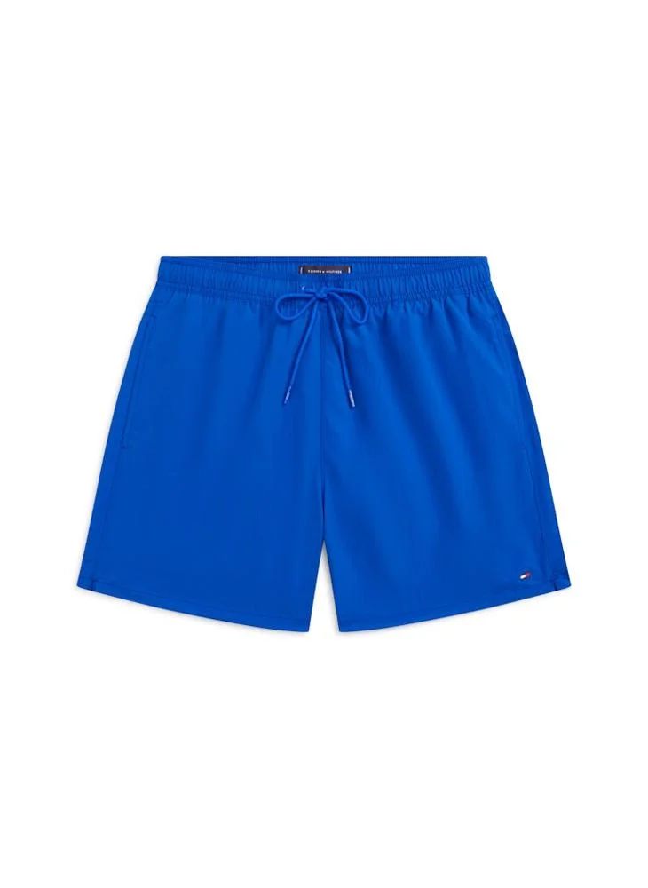 Tommy Hilfiger Regal Blue Flag Embroidery Mid Length Swim Shorts for Men | Best Price UAE