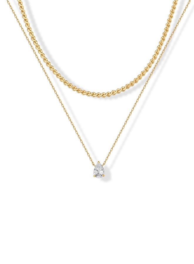 بافوا طقم قلادات متعددة الطبقات من PAVOI مطلية بالذهب الأصفر عيار 14 قيراطًا بتصميم سلسلة متعرجة مع قلادة من حجر سوليتير كمثري الشكل للنساء | طقم قلادات متعددة الطبقات مرصعة بالزركونيا المكعبة - Image 1