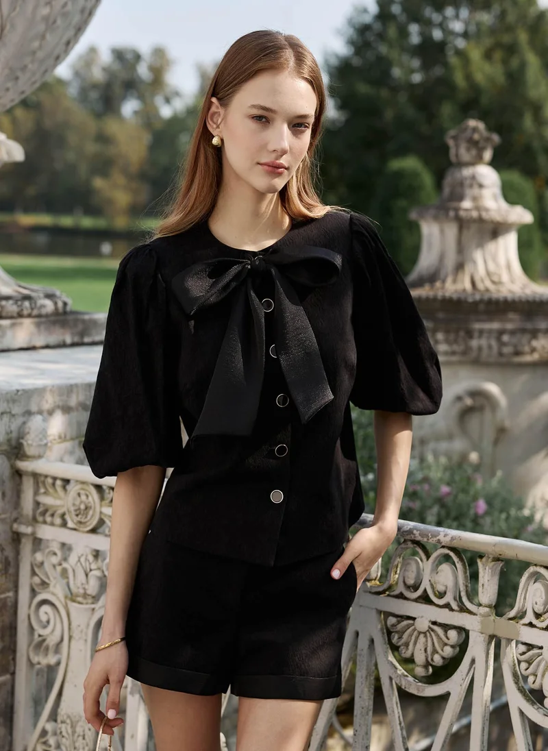 Lichi  Textured blouse with a voluminous bow for Women | Best Price UAE