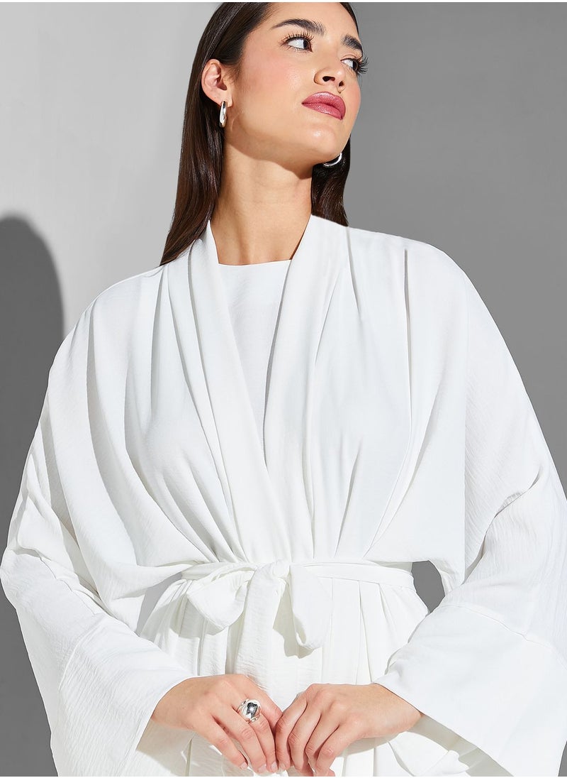 Namshi x Modanisa - Ruffle Tie Detail Abaya - Image 1