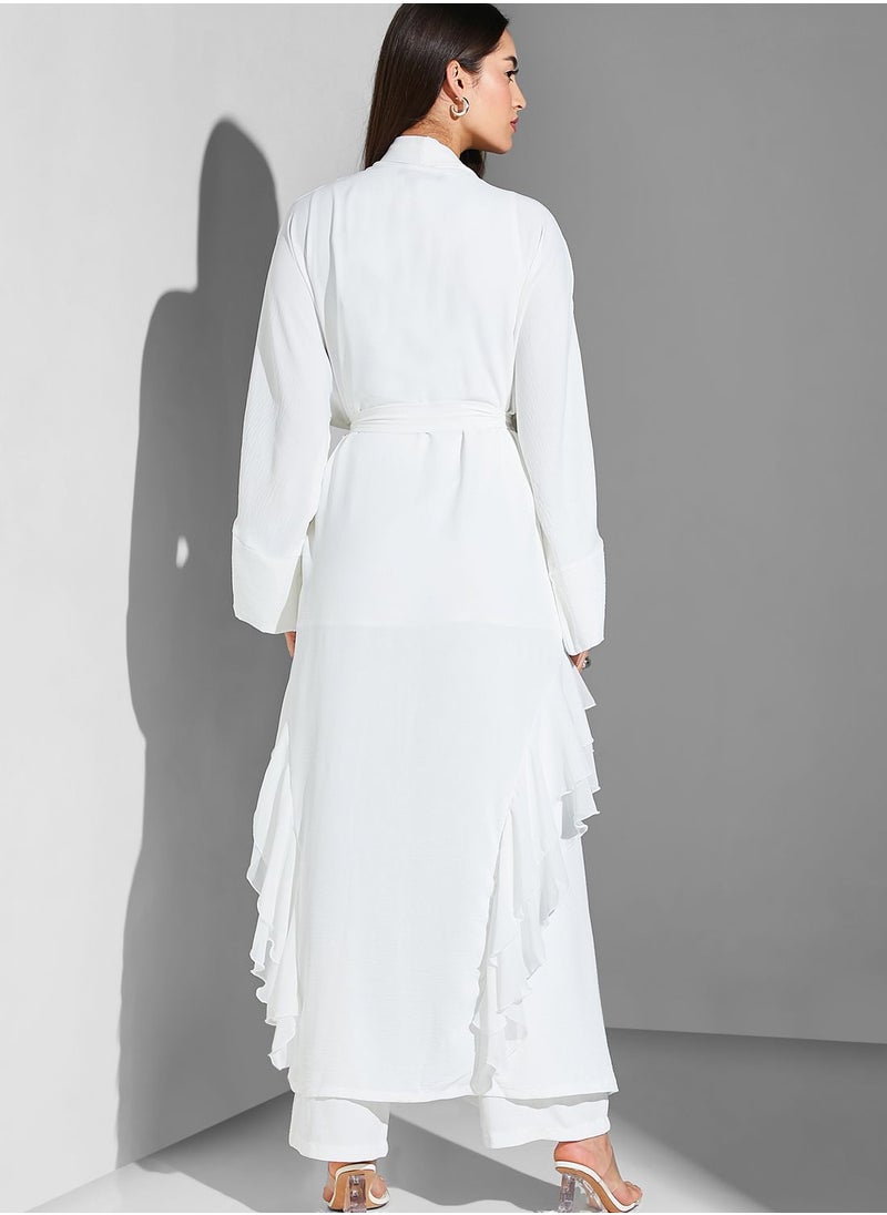 Namshi x Modanisa - Ruffle Tie Detail Abaya - Image 1