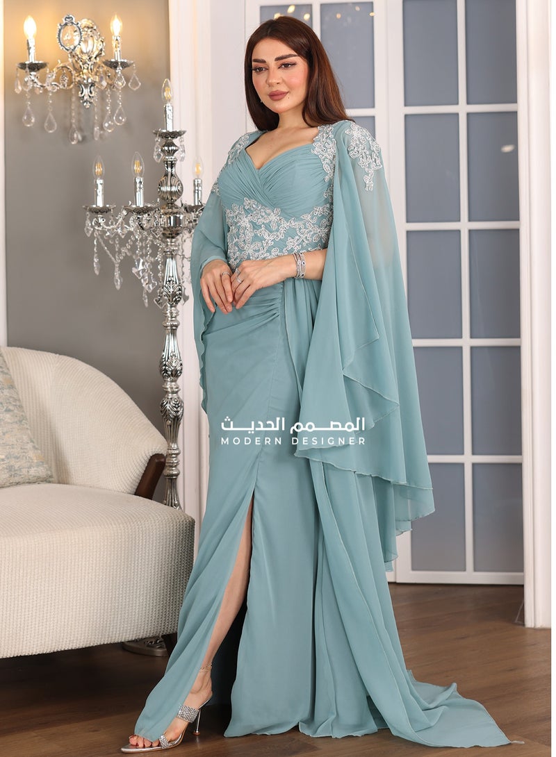 Modern Design An evening dress with elegant embroidery made of chiffon material in an elegant sky color with embroidery on the chest and shoulders. The dress is distinguished by its elegant design with a short back  - Image 2