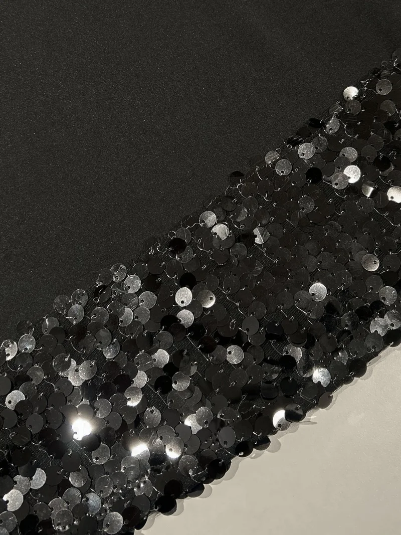 Outzidr  Black Halter Neck Top With Sequined Hem for Women | Best Price UAE